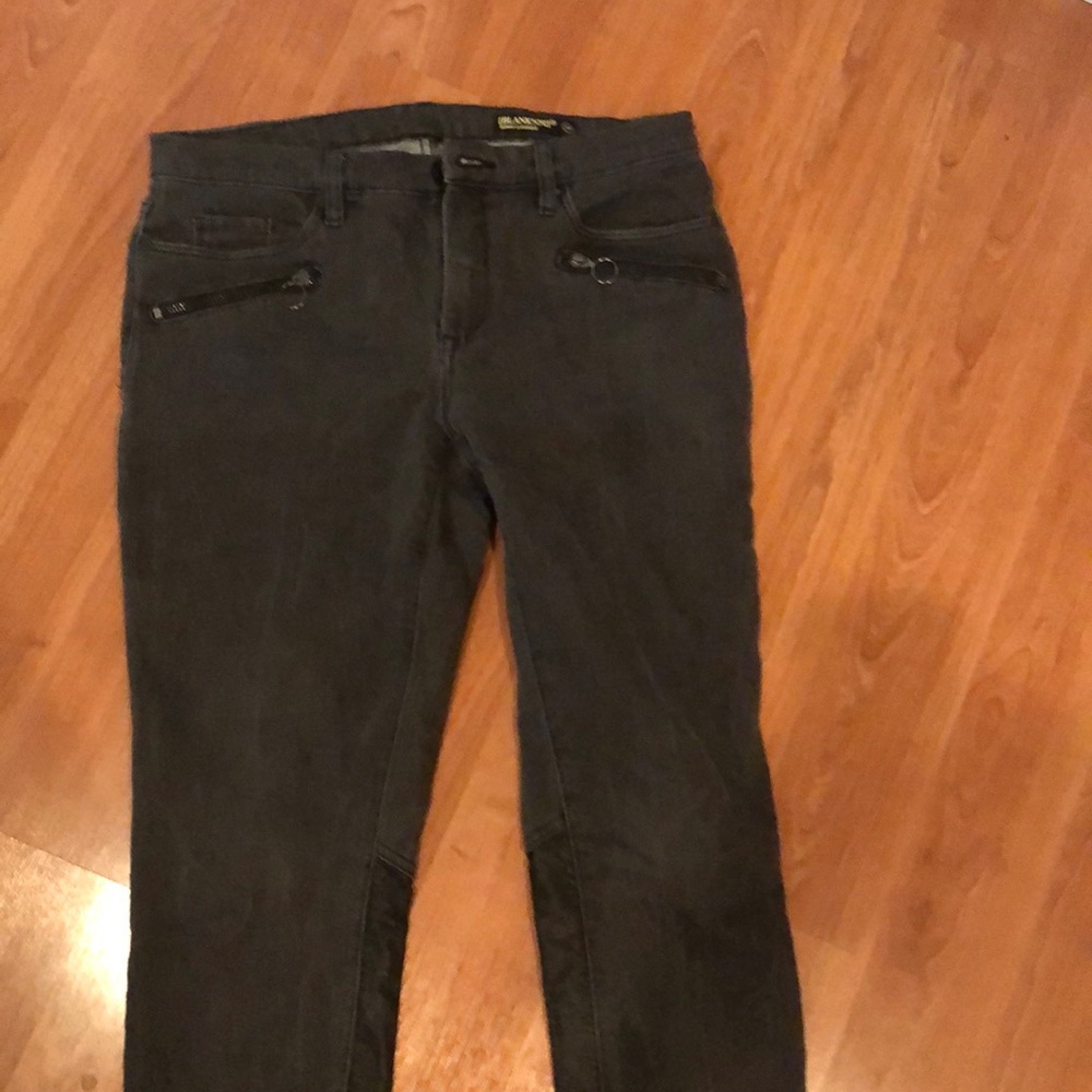 Black jeans zipper front and leather back